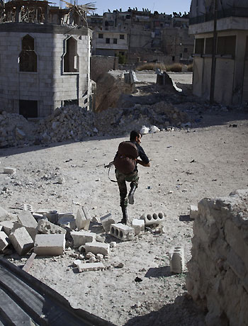 Jets hit town, Syria envoy flies in on truce bid