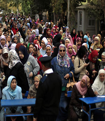 Egyptians narrowly back constitution, say rival camps
