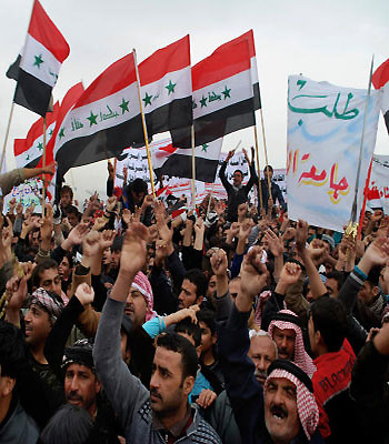 Scuffle breaks out in Iraqi parliament as thousands protest