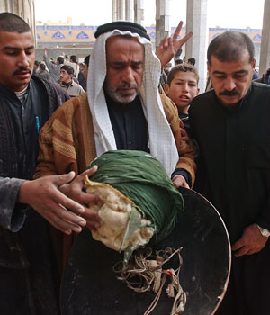Iraq shrine bombing fuels Shi’ite protests