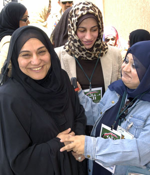 Women vote and run for office for first time in Kuwait