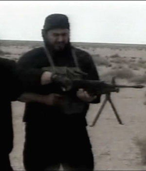 U.S. military releases footage of Al-Zarqawi fumbling with gun