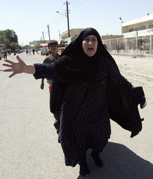 Iraqi politicians struggle to reach agreement on keysecurity posts; car bomb near bus station kills 4