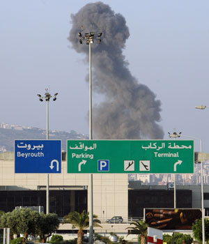 Israel hits Beirut airport again, keeps up assault