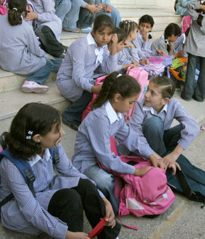 Striking teachers, demanding unpaid wages, shut down schools across West Bank and Gaza