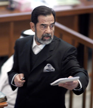 Judge’s observation that Saddam ‘not a dictator’ sparks call for him to resign