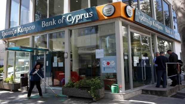 Cyprus Reopens Banks Under Tight Restrictions