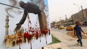 An Iraqi man walks past a billboard depicting the fall of executed dictator Saddam Hussein's statue in Baghdad on April 9, 2013. Source: AFP PHOTO/AHMAD AL-RUBAYE