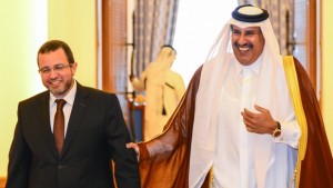 Egyptian Prime Minister Hisham Qandil (L) and Qatari Prime Minister Sheikh Hamad bin Jassim Al-Thani (R) arrive for a joint news conference at the Emiri Diwan in Doha, Qatar, on April 10, 2013. Source: EPA/STRINGER
