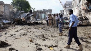 Somali policemen view the scene of a deadly blast in Mogadishu on April 14, 2013. Source: REUTERS/Omar Faruk