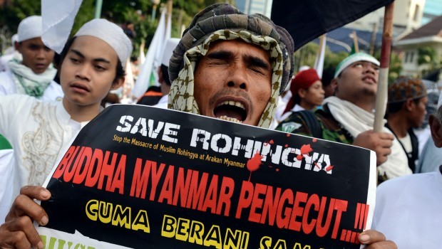 Boats carrying fleeing Rohingya Muslims capsize