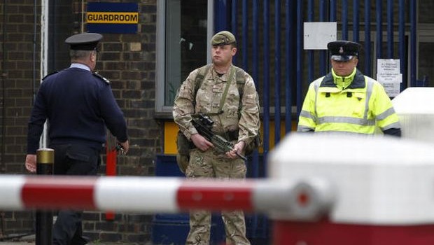 British PM seeks answers after soldier hacked to death