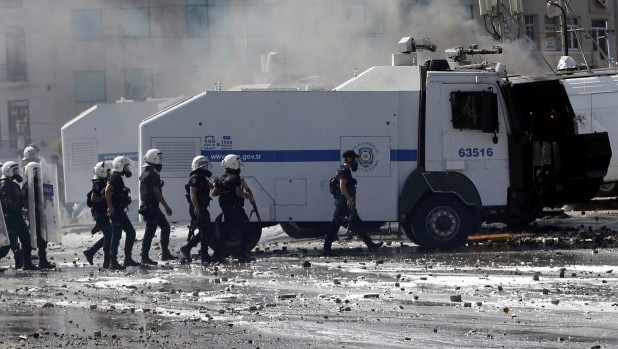 Turkish riot police clash with protesters in Taksim Square