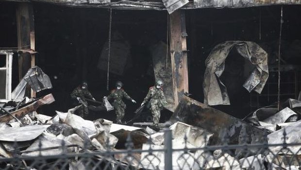 Fire, locked doors kill 119 at China poultry plant