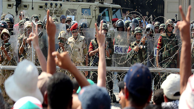 Pro-Mursi protesters killed as interim president dissolves Shura Council