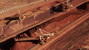 This undated file handout photo shows iron ore being stockpiled for export. (AFP PHOTO/FILES/BHP Billiton)