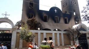 A picture taken on August 14, 2013, shows the facade of the Prince Tadros Coptic church after being torched by unknown assailants in the central Egyptian city of Minya. (AFP PHOTO/STR)