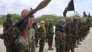 In this file photo from Thursday, October 21, 2010, Al-Shabaab fighters display weapons as they conduct military exercises in northern Mogadishu, Somalia. (AP Photo/Farah Abdi Warsameh-FILE)