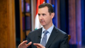 A handout picture released by the official Syrian Arab News Agency (SANA) on September 19, 2013, shows Syrian president Bashar Al-Assad gesturing during an interview with Fox News in the capital, Damascus. (AFP PHOTO/HO/SANA)