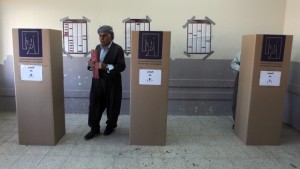 An Iraqi Kurdish man leaves a voting booth before casting his ballot during the Kurdistan's legislative election at a polling station on September 21, 2013 in the northern Kurdish city of Arbil. (AFP/ PHOTO/AHMAD AL-RUBAYE)