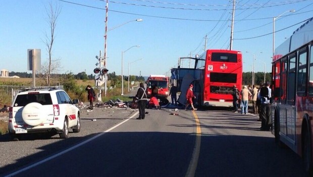 Canada passenger train collides with bus in capital, five dead