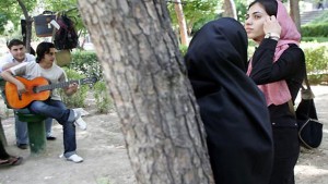 File photo of Iranian students relaxing in Tehran. (AFP/Behrouz Mehri)