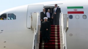 Iranian president Hassan Rouhani steps off his plane upon his arrival at Tehran's Mehrabad Airport, on September 28, 2013. (AFP PHOTO/ATTA KENARE)