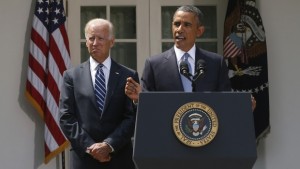 President Barack Obama stands with Vice President Joe Biden as he makes a statement about the crisis in Syria in the Rose Garden at the White House in Washington, DC, on Saturday, August 31, 2013. (AP Photo/Charles Dharapak)