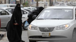 Saudi women board a taxi in Riyadh, Saudi Arabia, May 24, 2011. (AP Photo/Hassan Ammar, File)