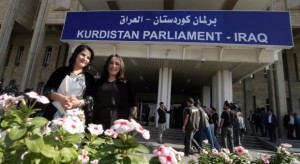 Female Kurdish deputies are pictured outside the Kurdistan parliament building in Erbil, the capital of the autonomous Kurdish region of northern Iraq, on November 6, 2013. (AFP PHOTO/SAFIN HAMED)