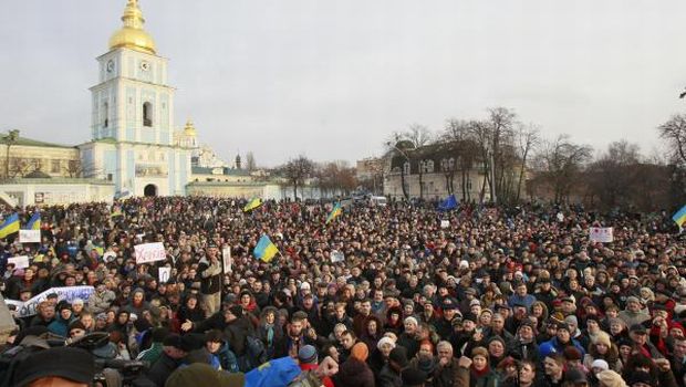Ukrainian demonstrators converge outside monastery