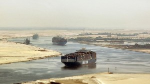 Cargo ships sail through the Suez Canal, seen from a helicopter, near Ismailia, Egypt, in this September 2009 file photo. (AP Photo, File)