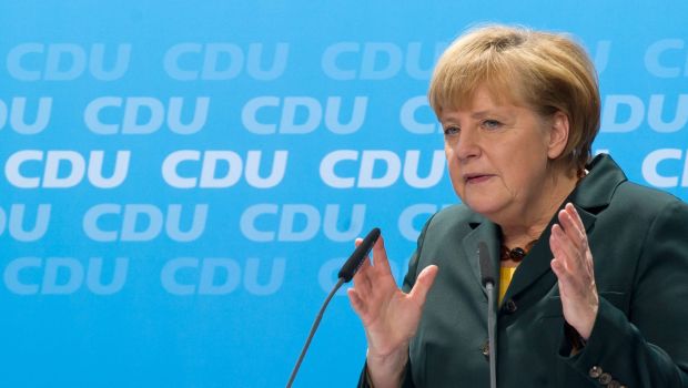 Merkel’s conservatives back coalition deal despite doubts