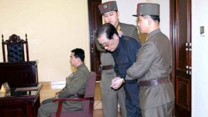 This photo released by Yonhap on December 13, 2013 shows Jang Song-Thaek (2nd-R) being escorted in court on December 12, 2013 (AFP PHOTO/YONHAP)