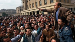 In this photo taken on Saturday, February 15, 2014, textile workers strike to demand a minimum wage, the removal of their company's head and the head of the firm's holding company, and back pay of yearly bonuses in Mahalla, Egypt. (AP Photo/Sabry Khaled)
