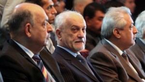 Iraqi Deputy Prime Minister for Energy Hussein Al-Shahristani, center, listens during a meeting gathering politicians and oil experts to discuss the export of oil from Iraq's northern Kurdish region on February 1, 2014 in the Iraqi capital, Baghdad. (AFP Photo/Sabah Arar)