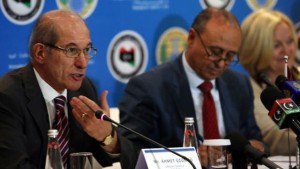 Ahmet Üzümcü, left, director of the OPCW, speaks during a press conference in Tripoli, Libya on February 4, 2014. (AFP Photo/Mahmud Turkia)