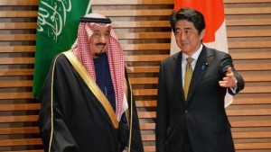 Saudi Arabian Crown Prince Salman Bin Abdulaziz, left, is greeted by Japanese Prime Minister Shinzo Abe for their talks at the prime minister's official residence in Tokyo on February 19, 2014. (AFP Photo/Pool/Yoshikazu Tsuno)