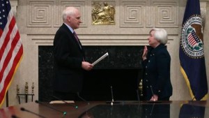 Janet Yellen, right, is sworn as Federal Reserve Chairman by the Fed’s board governor, Daniel Tarullo, at the Federal Reserve Building on February 3, 2013, in Washington, DC. (Mark Wilson/Getty Images/AFP Photo)
