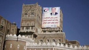 A poster of Yemen's President Abd-Rabbu Mansour Hadi is seen on a house in the Old Sanaa city February 1, 2014. (REUTERS/Khaled Abdullah)