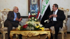Iraqi Foreign Minister Hoshyar Zebari, right, meets with his Iranian counterpart Mohammad Javad Zarif on January 14, 2014, in Baghdad, Iraq. (AFP Photo/Pool/Khalid Mohammed)