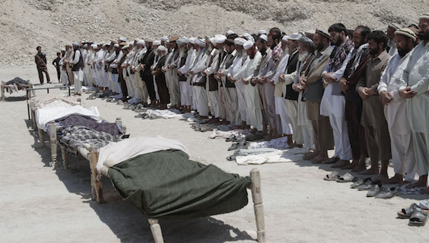 Afghan civilian deaths up in 2013 as war intensifies