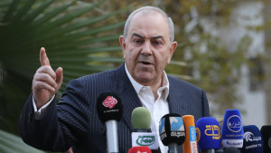 Ayad Allawi, the leader of Iraq's main Sunni-backed Iraqiya bloc and former Prime Minister, speaks to reporters, a day after Iraqi troops detained Ahmed al-Alwani, a Sunni lawmaker, in Baghdad, Iraq, Sunday, Dec. 29, 2013. Allawi demanded the release of al-Alwani after Iraqi troops detained al-Alwani sought on terrorism charges on Saturday and killed his brother and five of his guards after they opened fire on the arresting officers. The incident, which will likely to add to the nation's sectarian tensions, also left one Iraqi soldier dead. (AP Photo/Hadi Mizban)