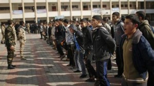 Members of the Palestinian security forces loyal to Hamas conduct a military-style exercise for Palestinian students at a school in Gaza City on January 7, 2014. (Reuters/Mohammed Salem)