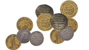 A collection of old coins minted in Islamic lands during a number of different eras. (Asharq Al-Awsat)