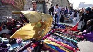 A vendor displays material used for traditional Kurdish costumes at a market on February 23, 2014 in Erbil, the capital of the autonomous Kurdish region of northern Iraq. (AFP Photo/Safin Hamed)
