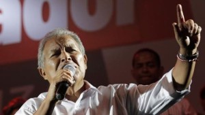 Salvador Sanchez Ceren, the presidential candidate for the Farabundo Marti National Liberation Front (FMLN), gives a speech to his supporters, after the official election results were released, in San Salvador, El Salvador, on March 9, 2014. (Reuters/Henry Romero)