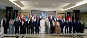 Arab leaders stand for a group photo before the 25th Arab League summit at Bayan palace in Kuwait City on March 25, 2014. (AFP PHOTO/YASSER AL-ZAYYAT)