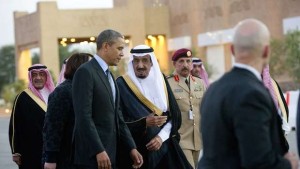 US President Barack Obama (C-L) is greeted by Saudi Crown Prince Salman bin Abdulaziz al-Saud (C-R) upon his arrival at Rawdat Khurayim, the monarch's desert camp 60 miles (35 miles) northeast of Riyadh ahead of a meeting with Saudi King Abdullah, on March 28, 2014. Obama arrived in Riyadh for talks with Saudi King Abdullah as mistrust fuelled by differences over Iran and Syria overshadows a decades-long alliance between their countries. AFP PHOTO / SAUL LOEB