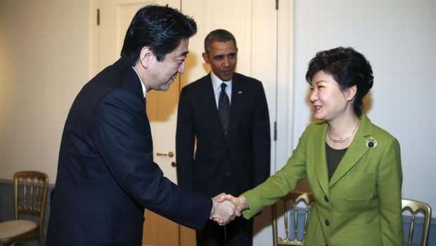 Obama brokers Japan, South Korea talks as Pyongyang fires missiles